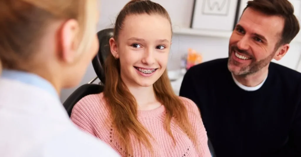 Family Dental Care Duluth teen smiling during dental checkup visit
