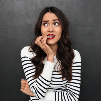 Worried woman dental anxiety Duluth Dental Studio care