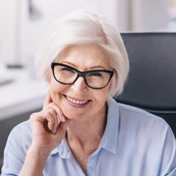 Smiling senior woman with glasses Duluth Dental Studio care
